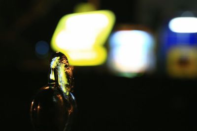 Close-up of illuminated lights at night