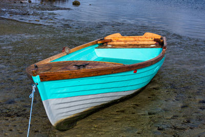 High angle view of boat moored on beach