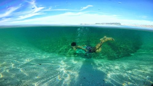 Man swimming in sea