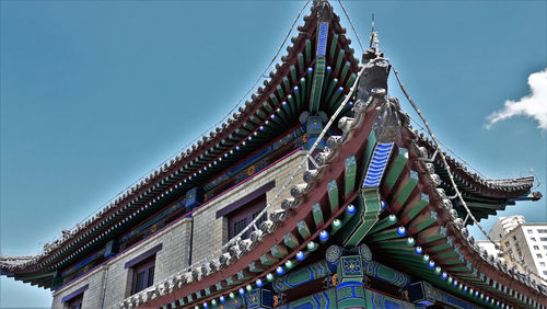 Low angle view of temple building against sky