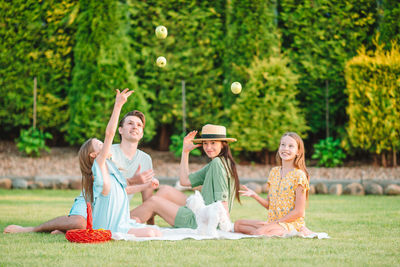 Cheerful family having great time at park