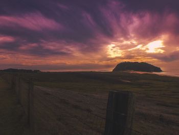 Scenic view of landscape against sky during sunset