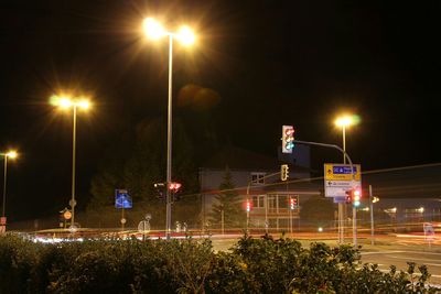 Illuminated street light at night