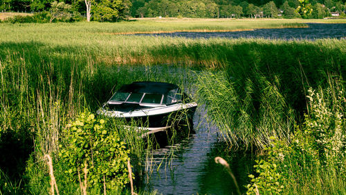 Boat moored in lake