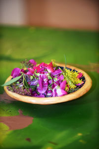 Close-up of purple flowers on table