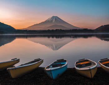 Panoramic view of shoji lake and mount fuji against sky during sunrise