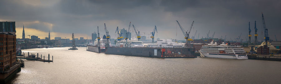 Panorama of hamburg harbour in the morning in bad weather