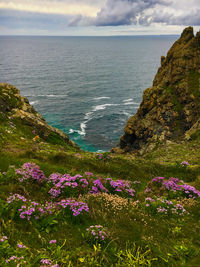 Scenic view of sea against cloudy sky