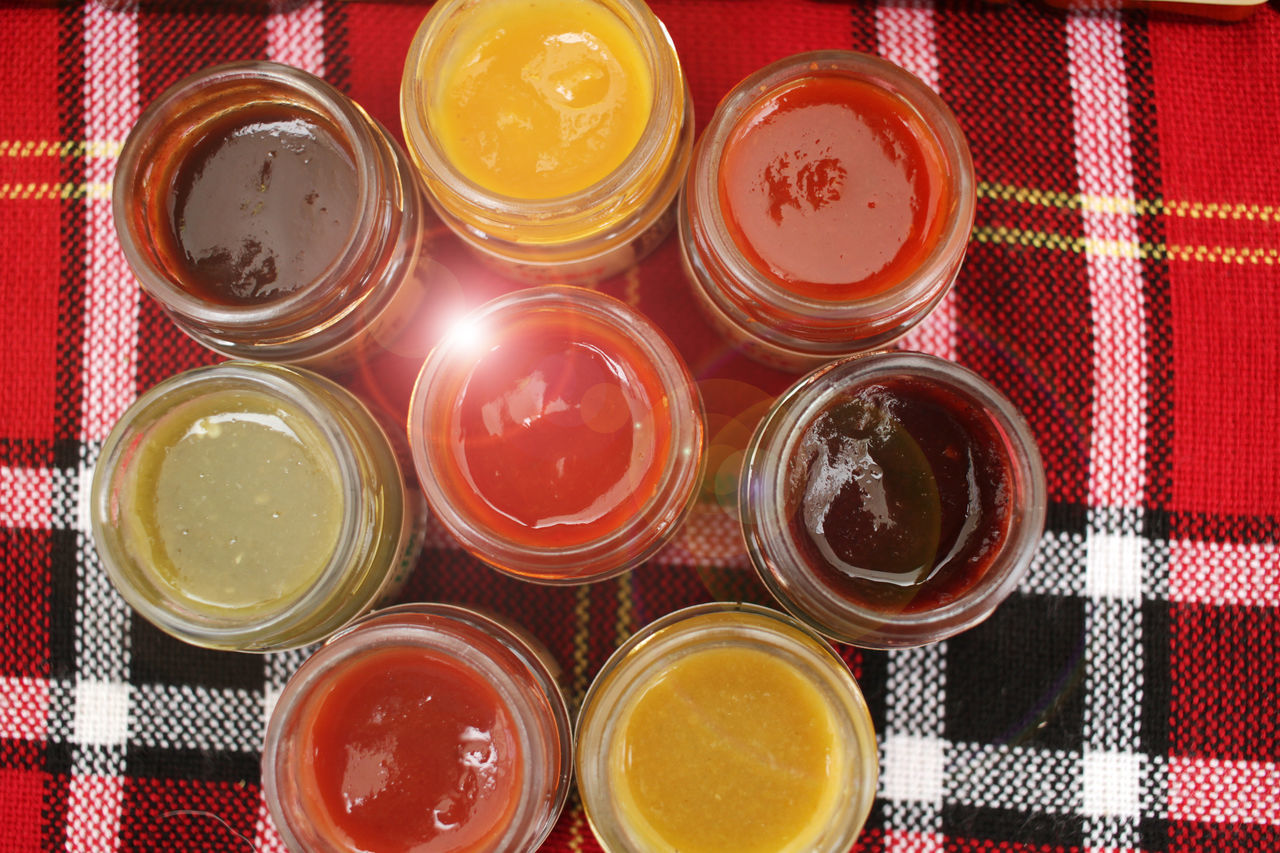 HIGH ANGLE VIEW OF DRINK IN JAR ON TABLE