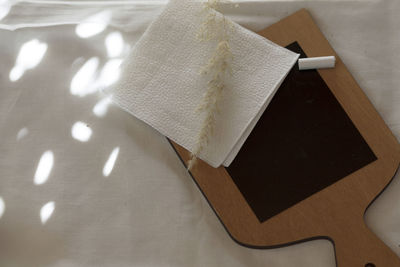 High angle view of paper on table