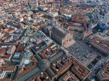 Aerial view of piazza duomo in front of the gothic cathedral in the center.