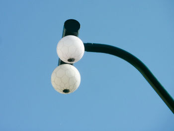 Low angle view of soccer ball against clear sky