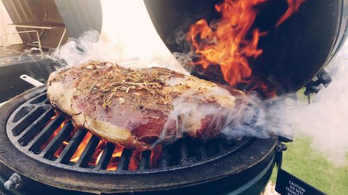 Close-up of meat on barbecue grill