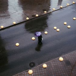 High angle view of person on wet road