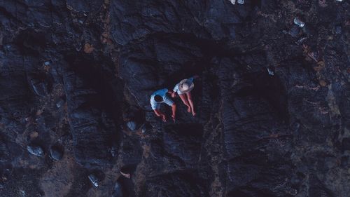 People on rock formation