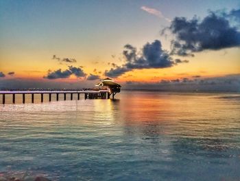 Scenic view of sea against sky during sunset