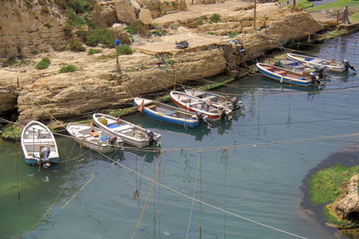 High angle view of fishing boats moored in lake