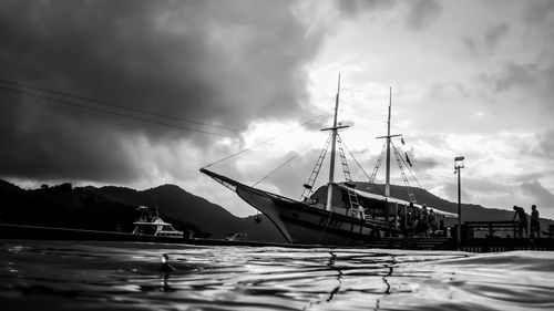 Ship in water against sky