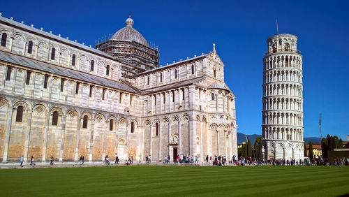 Group of people in front of historical building