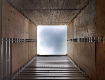 Low angle view of building against cloudy sky