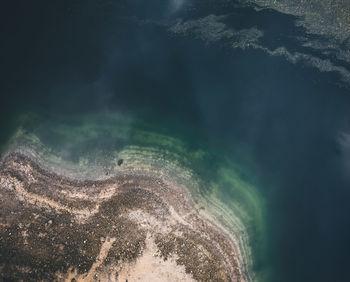 Close-up of rock in sea