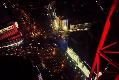 Aerial view of illuminated city at night