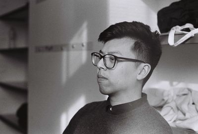 Close-up of boy wearing eyeglasses