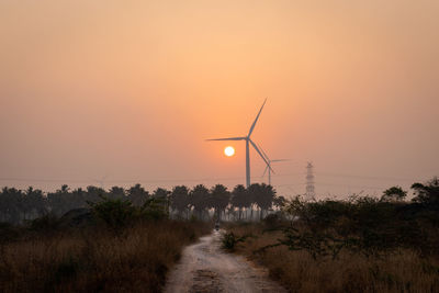 Sunrise with windmills and country roads is the real example of developing 