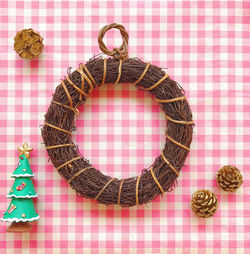 Directly above shot of christmas decoration on tablecloth