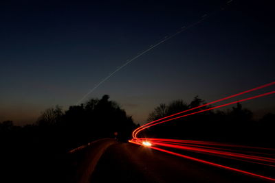 Light trails on road at night