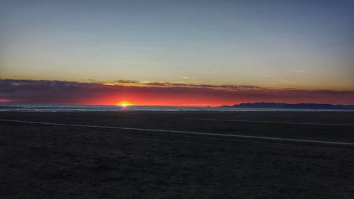 Scenic view of landscape against sky during sunset