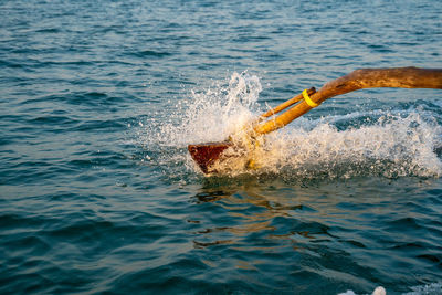 Water splashing on swimming in sea