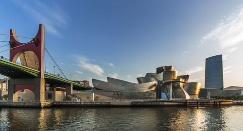 Low angle view of city at waterfront