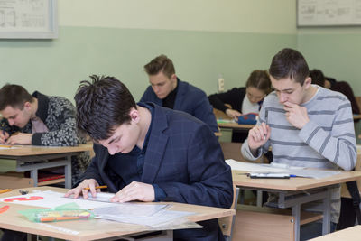 Group of people in front of a table