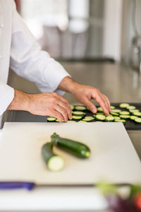 Close-up of hands preparing food