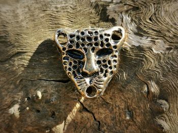 Jewelry on wood mask