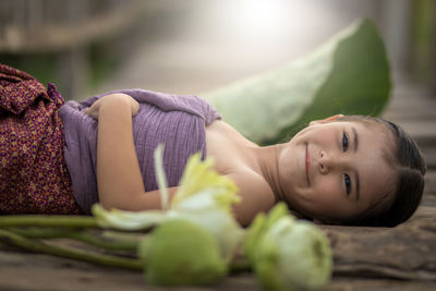 Portrait of woman relaxing outdoors