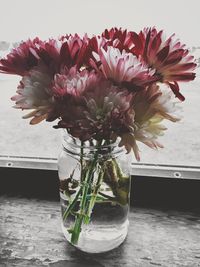 Close-up of flower vase on table