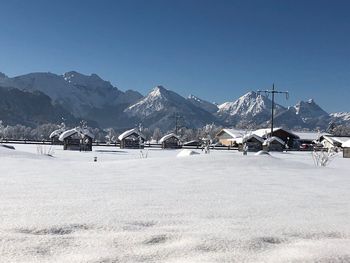 Scenic view of snowcapped mountains against sky