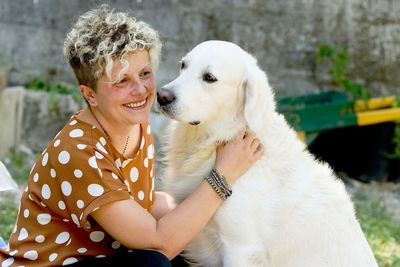 Portrait of woman with dog