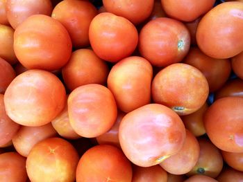 Full frame shot of oranges at market stall