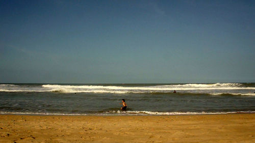 Scenic view of beach against sky