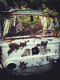 Close-up of abandoned car