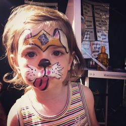 Portrait of child with face paint