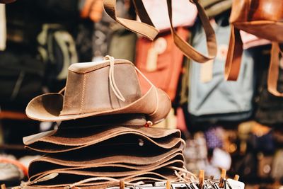 Close-up of leather hats for sale