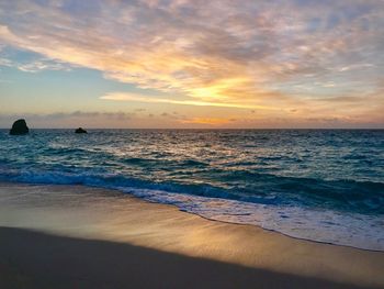 Scenic view of sea against sky during sunset