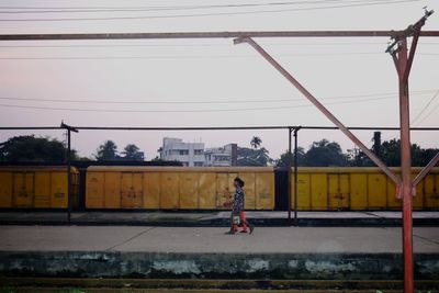 Man on road against sky