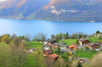 High angle view of lake and trees against sky