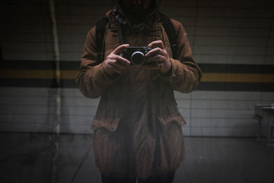 Full length of woman photographing