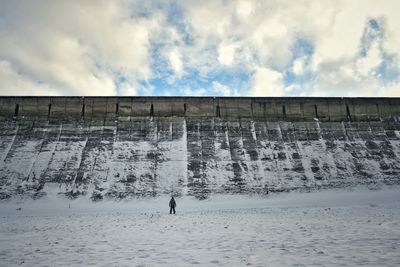 Full length of person against sky during winter